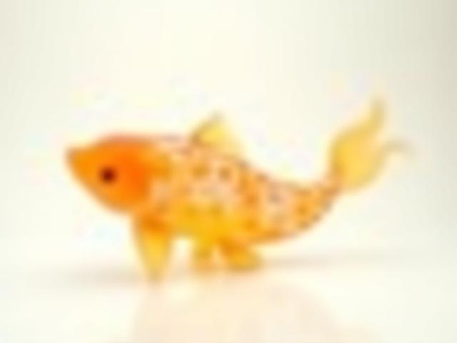 Elegant golden and white glass Koi fish sculpture, dynamic and serene